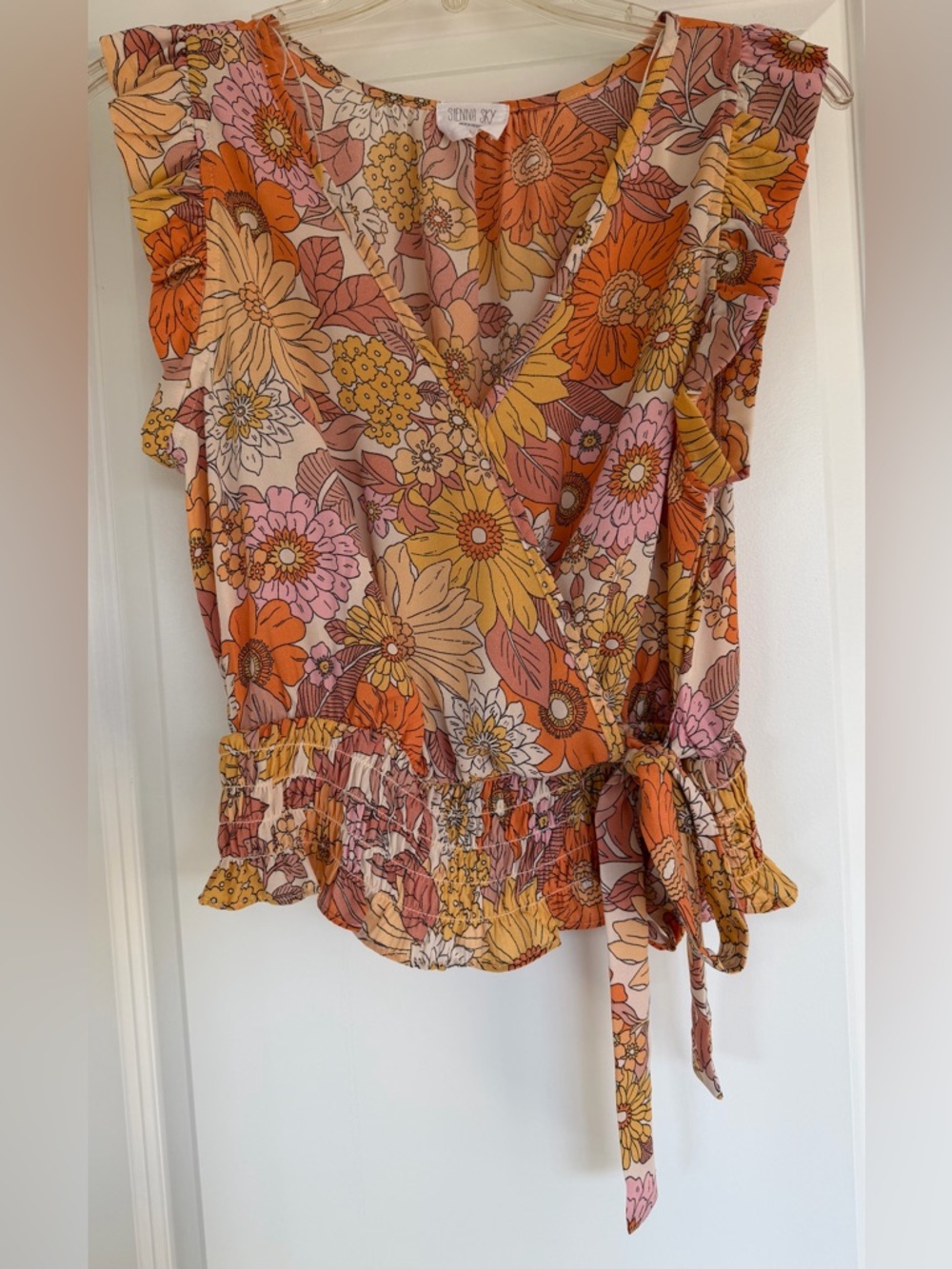 Sienna Sky Floral Wrap Peplum Top in Orange, Pink, Yellow